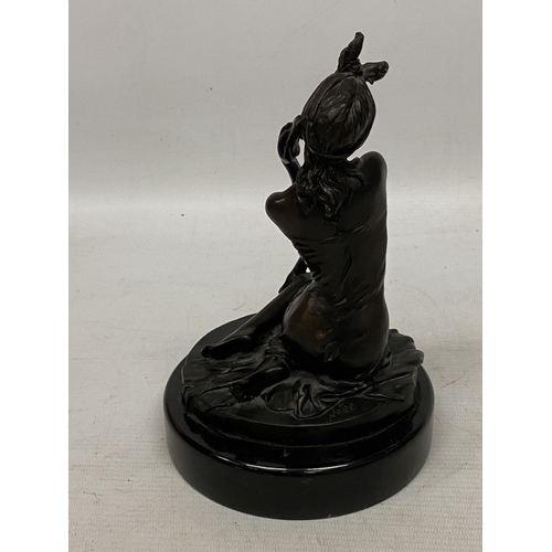 33 - A BRONZE SCULPTURE OF A WOMAN IN DRESS WITH PHONE ON A MARBLE BASE - SIGNED