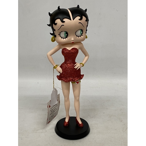 41 - A BETTY BOOP FIGURE IN A RED GLITTER DRESS