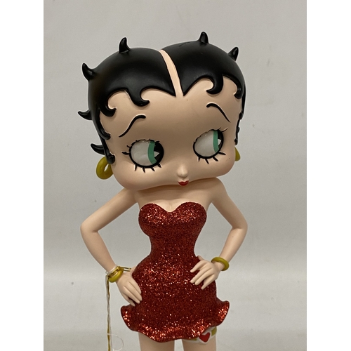 41 - A BETTY BOOP FIGURE IN A RED GLITTER DRESS