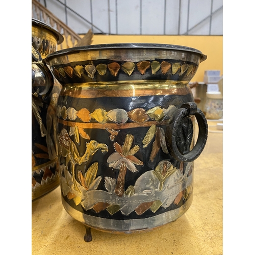 49 - TWO HAND-CRAFTED TUNISIAN COPPER AND BRASS FOOTED ICE BUCKETS WITH DESERT SCENES