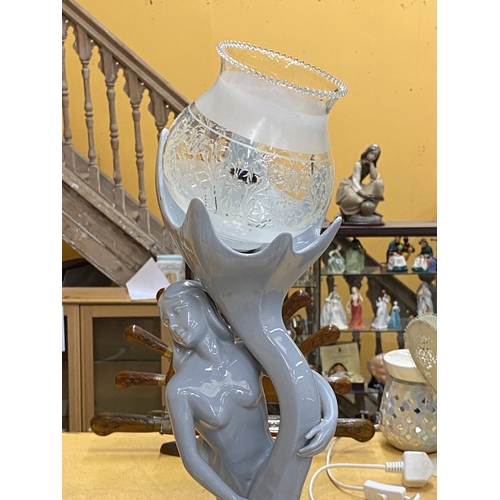 50 - AN ART DECO STYLE CERAMIC TABLE LAMP OF A MERMAID WITH ETCHED GLASS SHADE