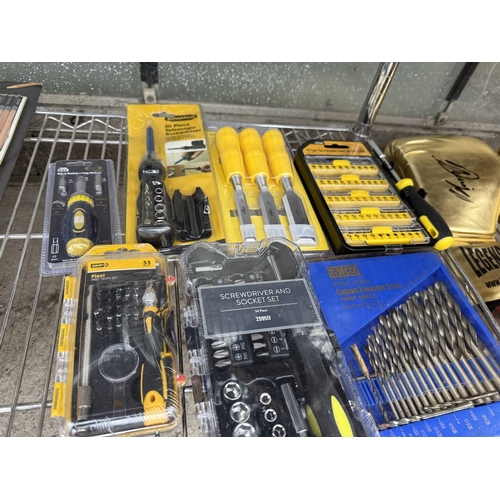 A LARGE ASSORTMENT OF AS NEW AND PACKAGED TOOLS TO INCLUDE DRILL BITS ...