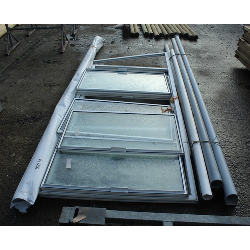 A BUNDLE OF RAINWATER PIPES AND SECONDARY DOUBLE GLAZING NO VAT