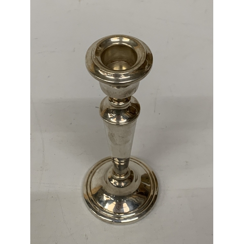 41 - A HALLMARKED BIRMINGHAM SILVER CANDLESTICK ON A WEIGHTED BASE - GROSS WEIGHT 174 G