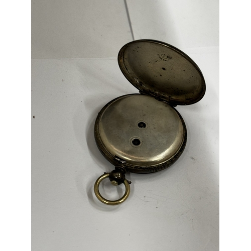 623 - A SILVER FOB WATCH WITH DECORATIVE WHITE ENAMEL WITH ROMAN NUMERALS SEEN WORKING BUT NO WARRANTY GIV... 