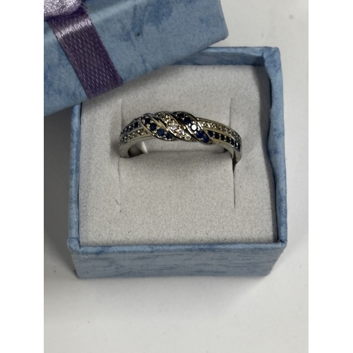 654 - A MARKED 925 CUBIC ZIRCONIA SAPHIRE 'I LOVE YOU' INSCRIBED RING SIZE O IN A PRESNTATION BOX