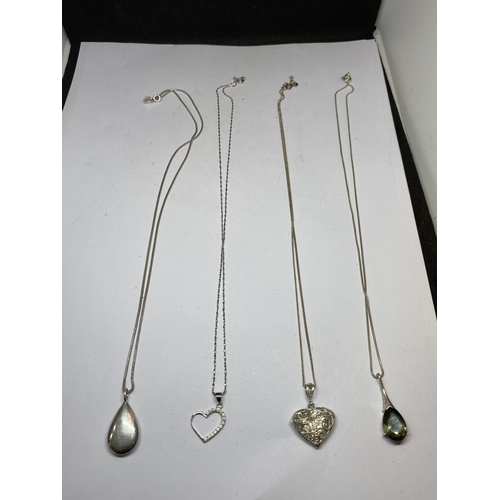 709 - FOUR SILVER NECKLACES WITH PENDANTS
