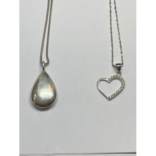 709 - FOUR SILVER NECKLACES WITH PENDANTS