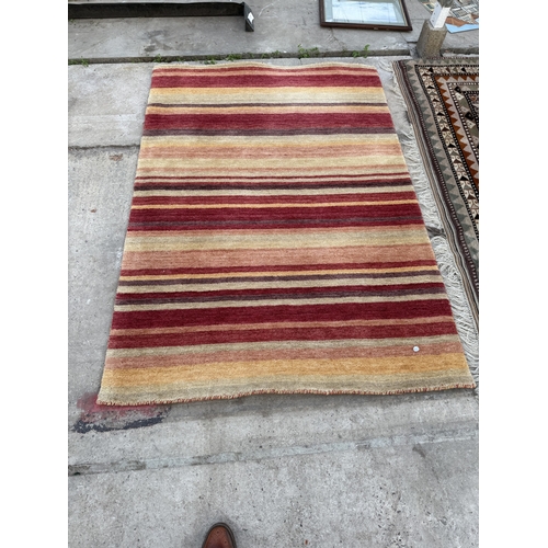 2499 - A LAURA ASHLEY MULTI COLOURED RUG 177 CM X 124 CM