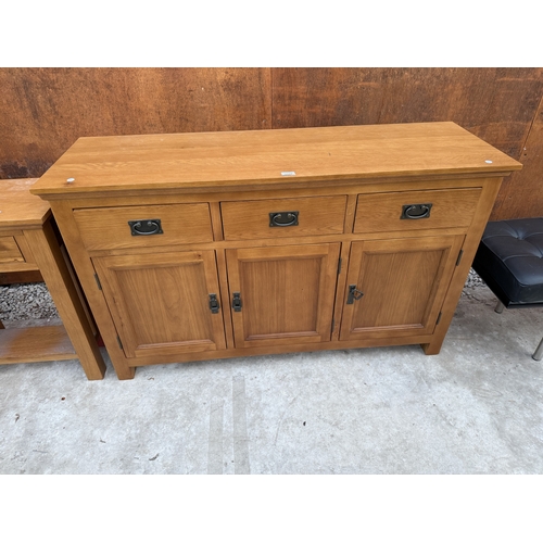 2518 - AN OAK SIDEBOARD ENCLOSING THREE DRAWERS AND THREE CUPBOARDS, 55