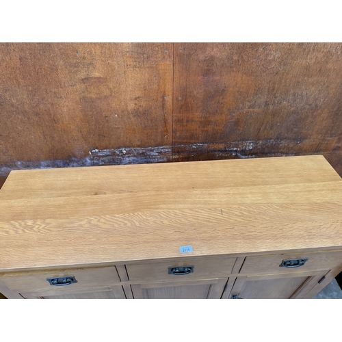 2518 - AN OAK SIDEBOARD ENCLOSING THREE DRAWERS AND THREE CUPBOARDS, 55