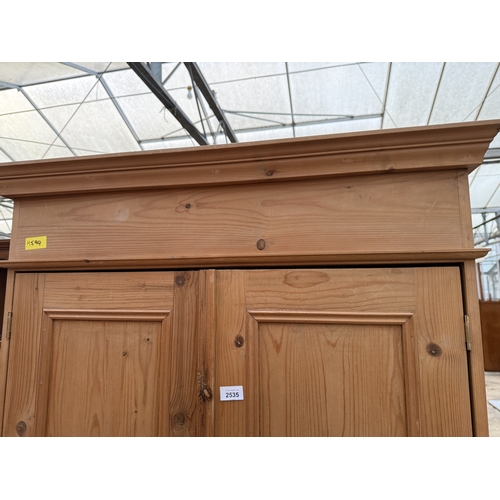 2535 - A PINE TWO DOOR WARDROBE WITH DRAWER TO BASE, 37
