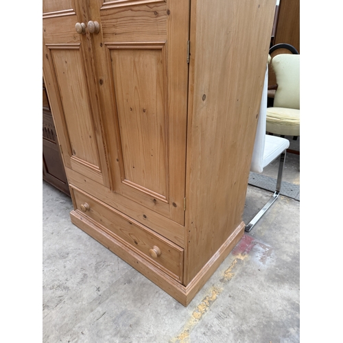 2535 - A PINE TWO DOOR WARDROBE WITH DRAWER TO BASE, 37