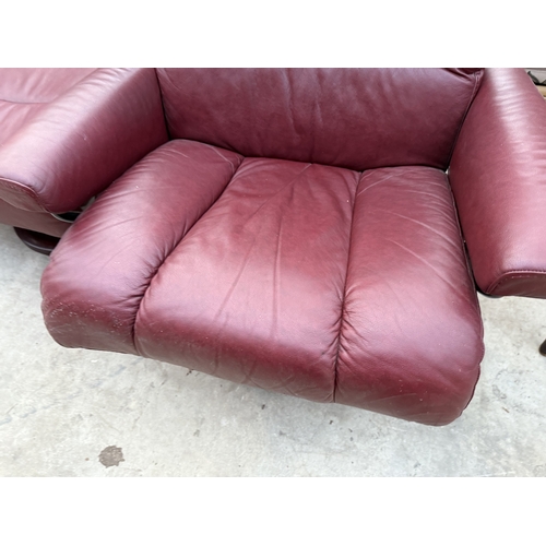 2540 - A STRESSLESS EKORNES LEATHER SWIVEL RECLINER CHAIR AND STOOL