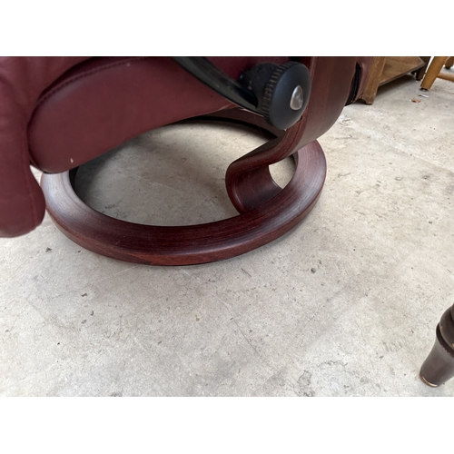 2540 - A STRESSLESS EKORNES LEATHER SWIVEL RECLINER CHAIR AND STOOL