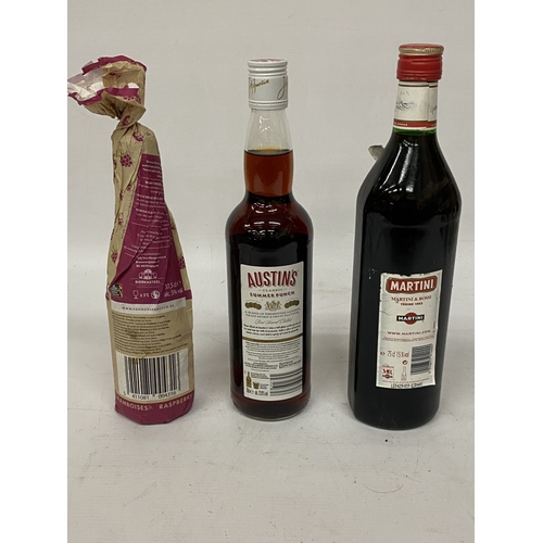 327 - THREE BOTTLES TO INCLUDE A 75CL BOTTLE OF MARTINI ROSSO, A 70CL BOTTLE OF AUSTIN'S SUMMER PUNCH AND ... 