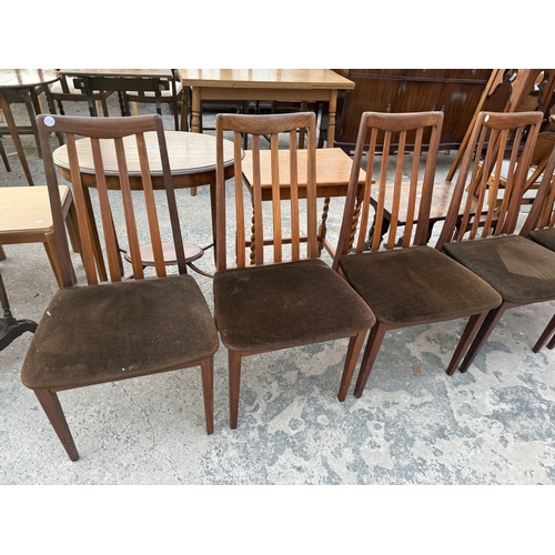 2568 - FOUR G PLAN RETRO TEAK DINING CHIARS ON TAPERING LEGS WITH SLATTED BACKS