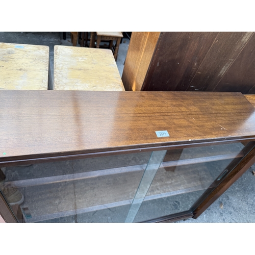 2573 - A G PLAN E GOMME RETRO BOOKCASE WITH TWO SLIDING DOORS, 36