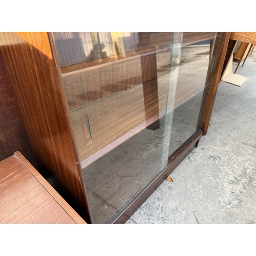 2573 - A G PLAN E GOMME RETRO BOOKCASE WITH TWO SLIDING DOORS, 36