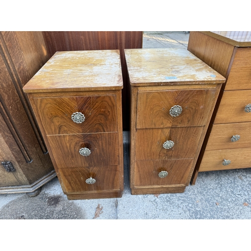 2579 - A PAIR OF MID 20TH CENTURY WALNUT BEDSIDE CHESTS