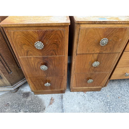 2579 - A PAIR OF MID 20TH CENTURY WALNUT BEDSIDE CHESTS