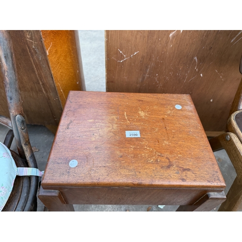 2590 - AN EDWARDIAN MAHOGANY SEWING BOX/STOOL ON TAPERING LEGS