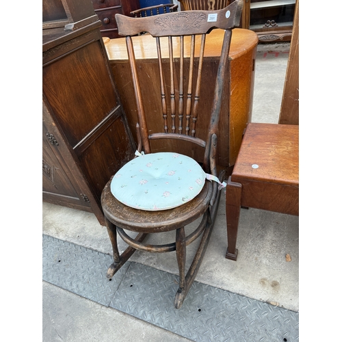 2591 - A BENTWOOD ROCKING CHAIR WITH SPINDLE BACK