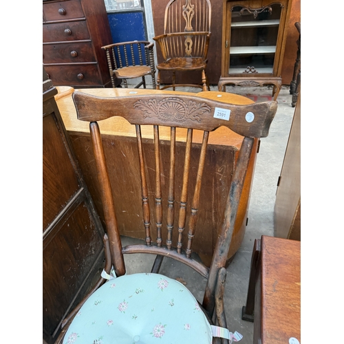 2591 - A BENTWOOD ROCKING CHAIR WITH SPINDLE BACK