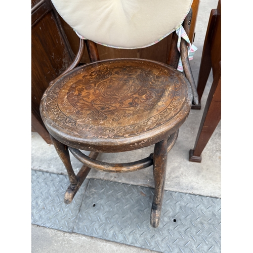2591 - A BENTWOOD ROCKING CHAIR WITH SPINDLE BACK