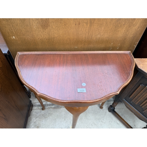 2600 - A DEMI LUNE HALL TABLE