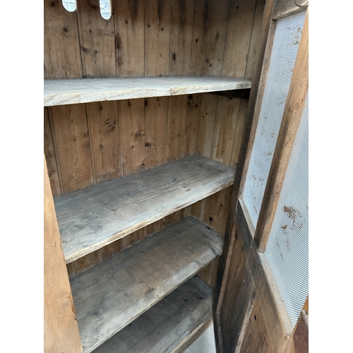 2624 - AN EARLY 20TH CENTURY PINE LARDER CUPBOARD WITH METAL MESH DOOR PANELS, 35.5