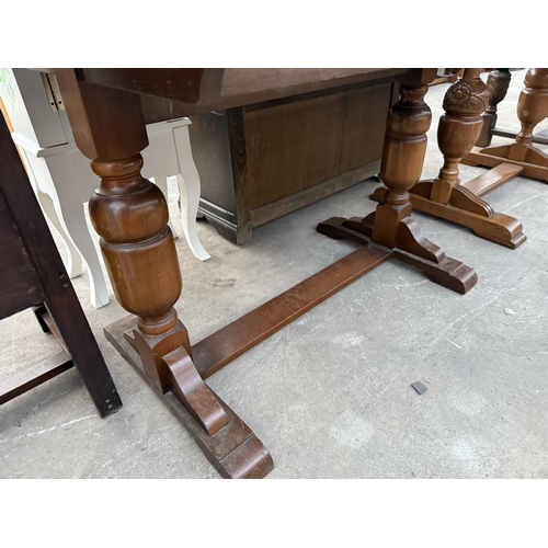2633 - A MID 20TH CENTURY OAK TWIN PEDESTAL DRAW LEAF DINING TABLE