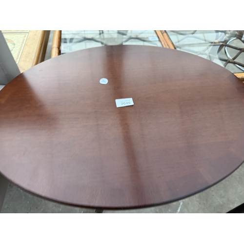 2640 - AN OVAL MAHOGANY OCCASIONAL TABLE