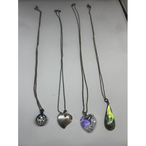531 - FOUR SILVER NECKLACES WITH PENDANTS