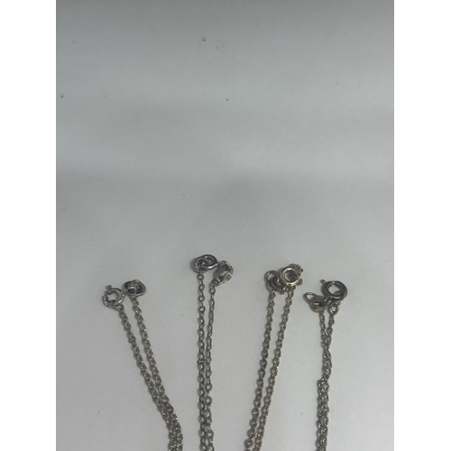 531 - FOUR SILVER NECKLACES WITH PENDANTS