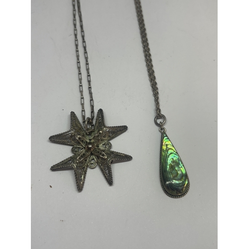 541 - FOUR SILVER NECKLACES WITH PENDANTS