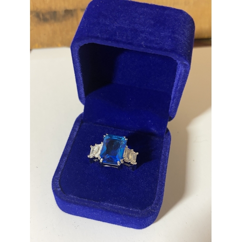 615 - A MARKED 925 LARGE BLUESTONE RING SIZE S IN A PRESENTATION BOX