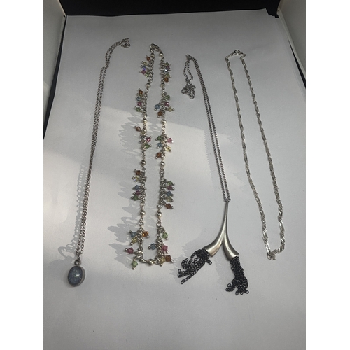 743 - FOUR SILVER NECKLACES THREE WITH PENDANTS GROSS WEIGHT 38.33 GRAMS