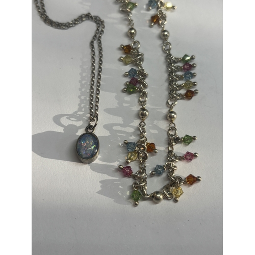 743 - FOUR SILVER NECKLACES THREE WITH PENDANTS GROSS WEIGHT 38.33 GRAMS