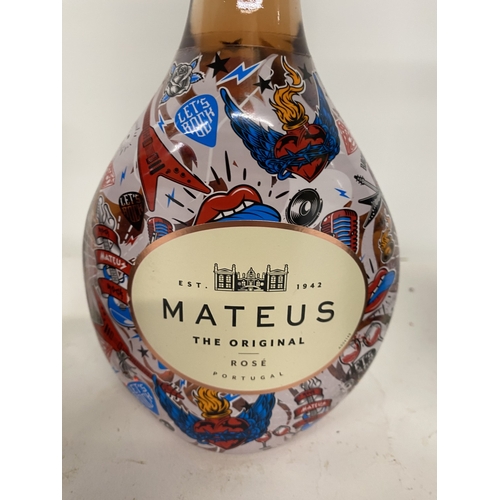 409 - THREE BOTTLES TO INCLUDE A 75CL LIMITED EDITION MATEUS ROSE, A 75CL LIMITED EDITION FRANCE '98 JP CH... 