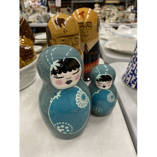 145 - TWO LARGE RUSSIAN NESTING DOLL TOGETHER WITH TWO CERAMIC MATRYOSHKA DOLL FIGURES