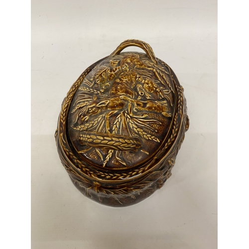 184 - A PORTMEIRION OVEN TO TABLE LIDDED DISH WITH DEER, PHEASANT AND RABBIT DECORATION
