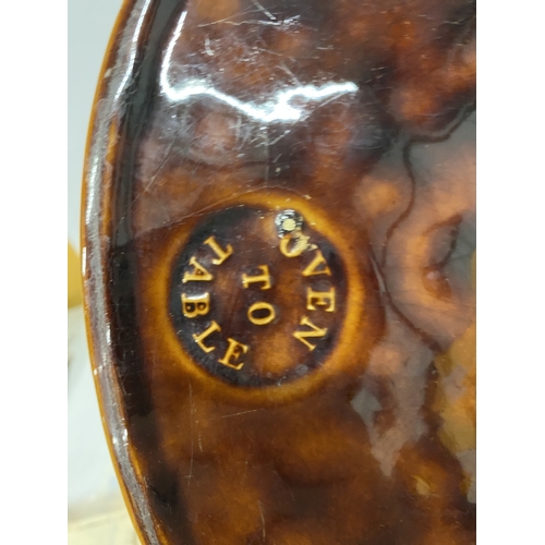 184 - A PORTMEIRION OVEN TO TABLE LIDDED DISH WITH DEER, PHEASANT AND RABBIT DECORATION