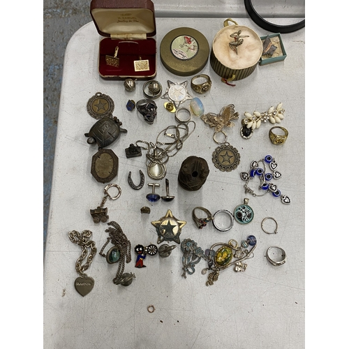 215 - A QUANTITY OF COSTUME JEWELLERY TO INCLUDE RINGS, BROOCHES, NECKLACES, PIN BADGES, CUFFLINKS, ETC