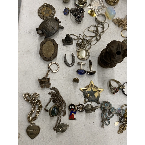 215 - A QUANTITY OF COSTUME JEWELLERY TO INCLUDE RINGS, BROOCHES, NECKLACES, PIN BADGES, CUFFLINKS, ETC