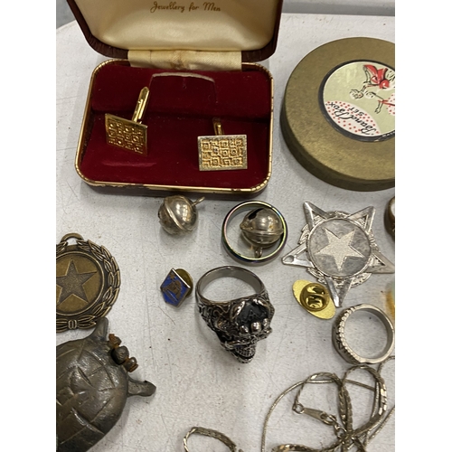 215 - A QUANTITY OF COSTUME JEWELLERY TO INCLUDE RINGS, BROOCHES, NECKLACES, PIN BADGES, CUFFLINKS, ETC