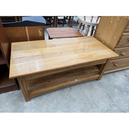 2777 - AN OAK TWO TIER COFFEE TABLE ENCLOSING TWO DRAWERS, 45