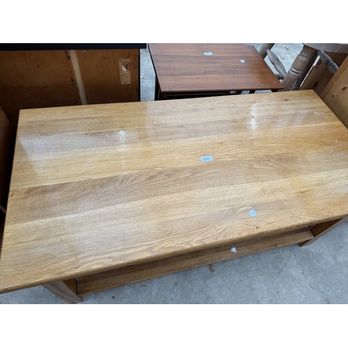 2777 - AN OAK TWO TIER COFFEE TABLE ENCLOSING TWO DRAWERS, 45