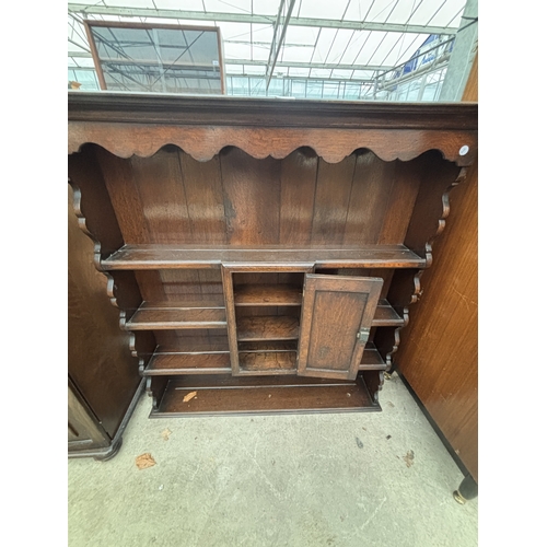 2701 - AN OAK DRESSER RACK ENCLOSING CUPBOARD, 42