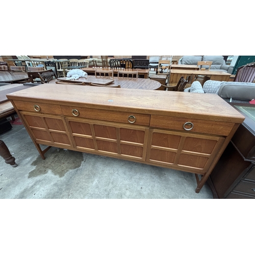 2714 - A NATHAN RETRO TEAK SIDEBOARD ENCLOSING THREE DRAWERS AND THREE CUPBOARDS, 72